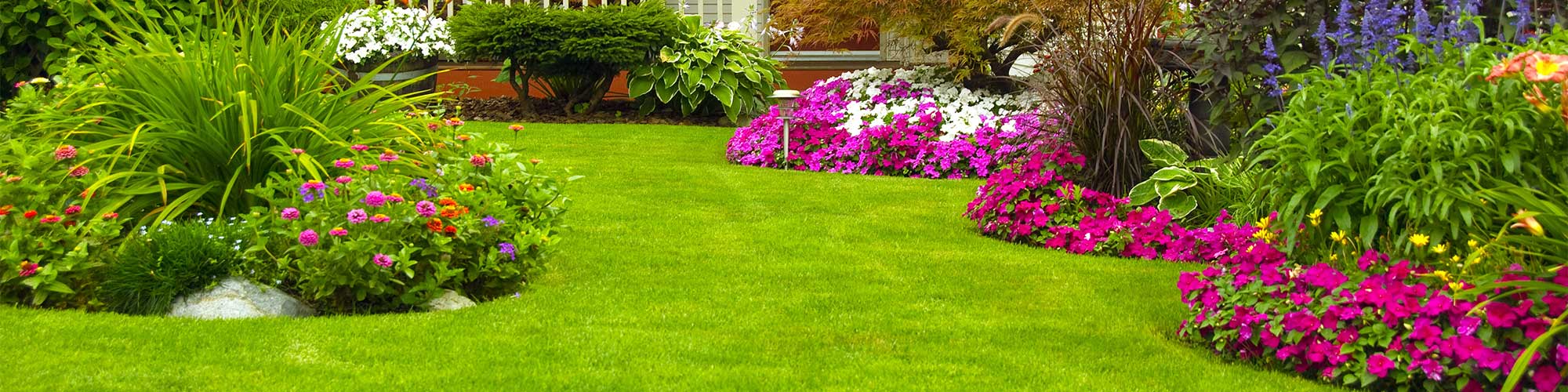 Landscaped Yard With Flowers and Bushes